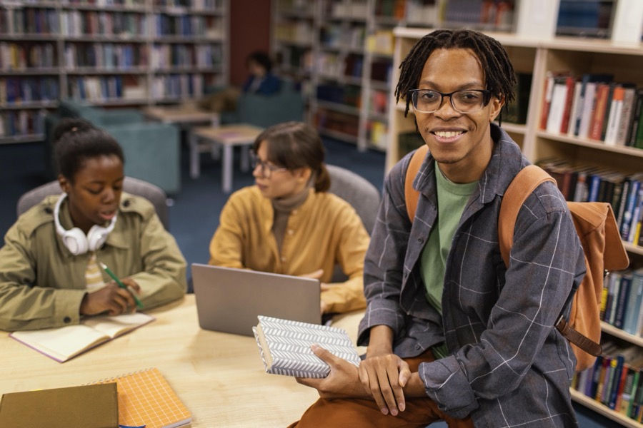 Students studying together in a university library