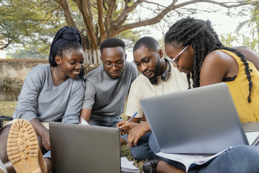 A study group working together outdoors