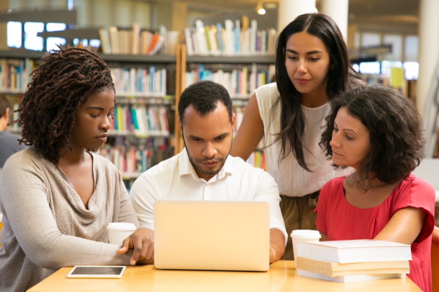 Students working together in a public library